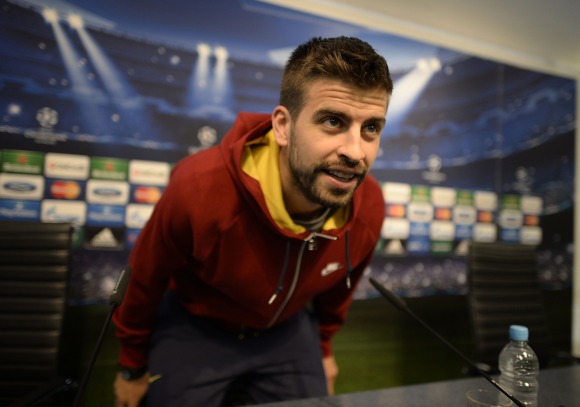 Pique-rp-sentado-champions-2014-reuters.jpg