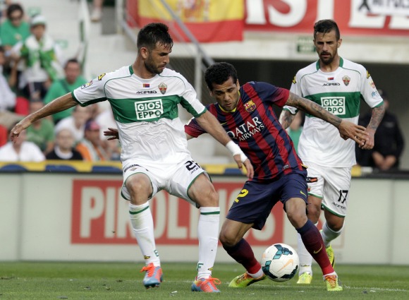 Alves-Elche-2014-reuters.jpg