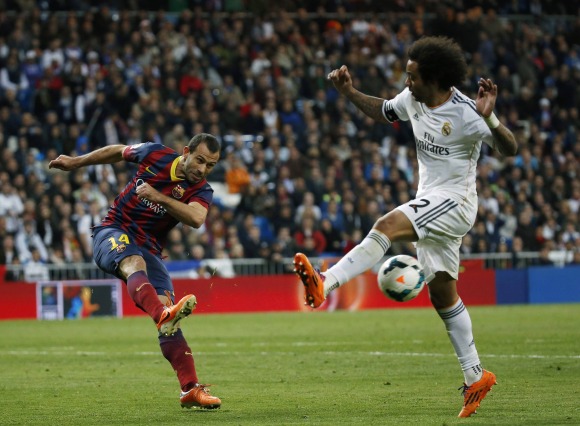 Mascherano-despeja-Marcelo-2014-reuters.jpg