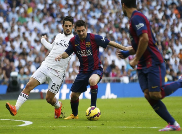Isco-lucha-Messi-2014-reuters.jpg