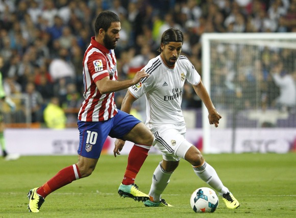 Khedira-Arda-Turan-2014-efe.jpg