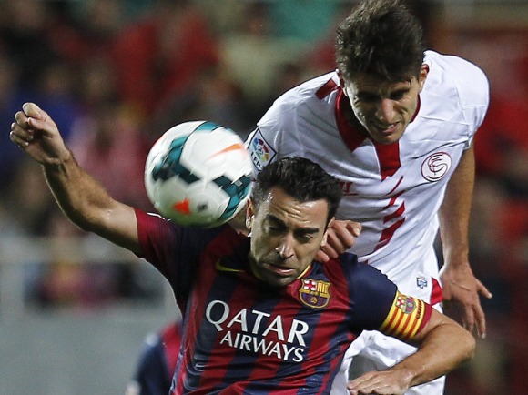 Xavi-salto-Sevilla-2014-efe.jpg