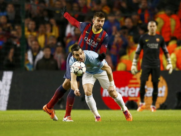 Negredo-Pique-2014-reuters.jpg