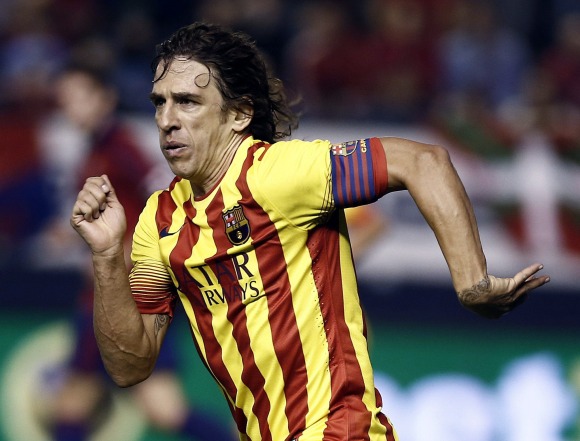 Puyol-carrera-2014-efe.jpg