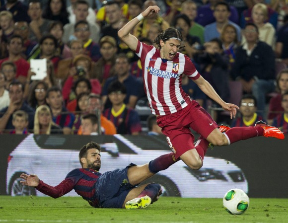 Filipe-Luis-pique-2014-efe.jpg