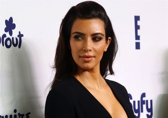 kim-subasta-ropa.jpg