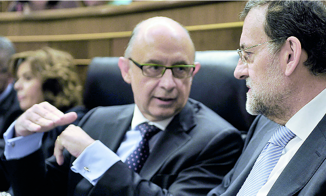 rajoy-montoro-manos-665.png