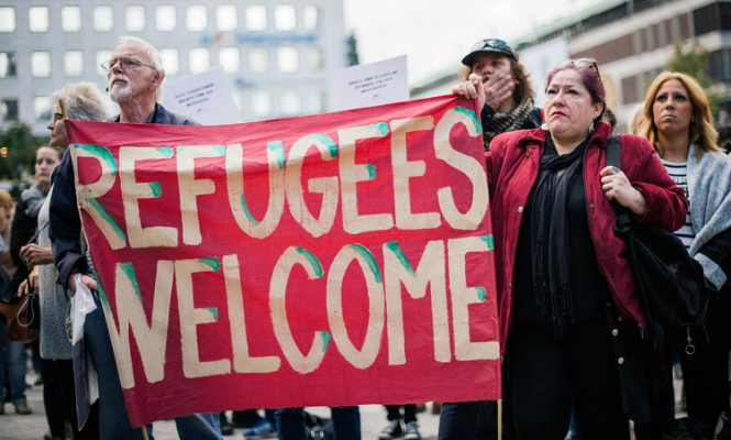 refugees-welcome-665400.jpg