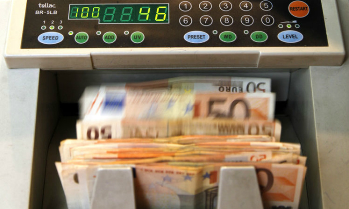 dinero-euros-maquina-contar.jpg