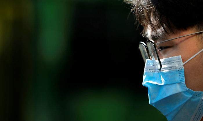 700x420_coronavirus-wuhan-hombre-mascarilla-reuters.jpg
