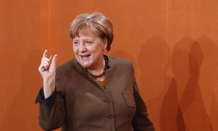 merkel-risas-chiquitin.jpg