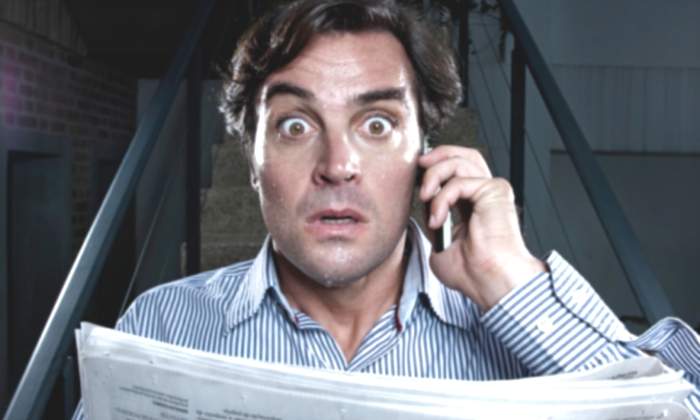 broker-asustado-periodico.jpg