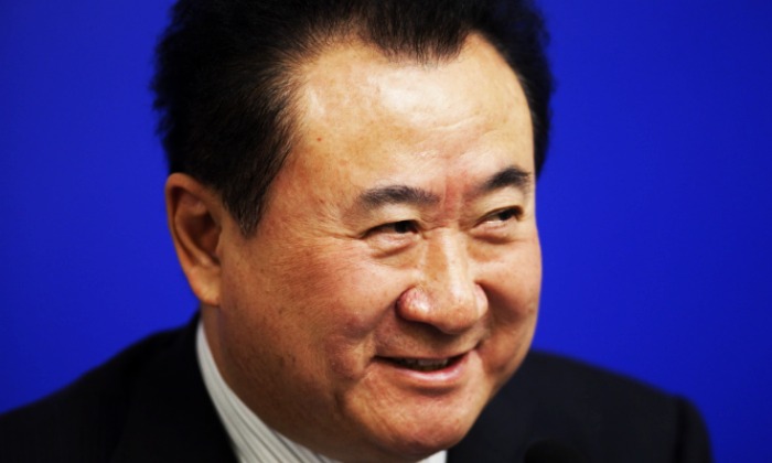 Jianlin-Wang-fondo-azul-700.jpg