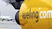 Vueling frena su crecimiento en El Prat por el temor a otro verano de caos aéreo