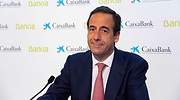 CaixaBank gana 2.022 millones sin el efecto fusión y supera el beneficio preCovid en un 60%