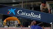 CaixaBank gana 2.022 millones sin el efecto fusión y supera el beneficio preCovid en un 60%