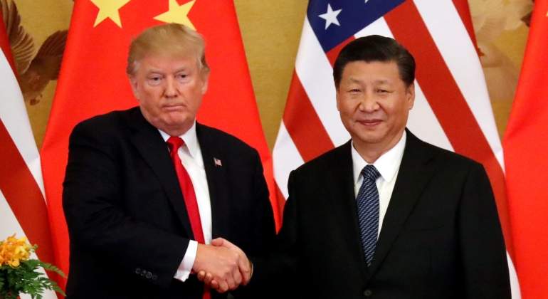 trump-xi-manos-banderas-reuters.jpg