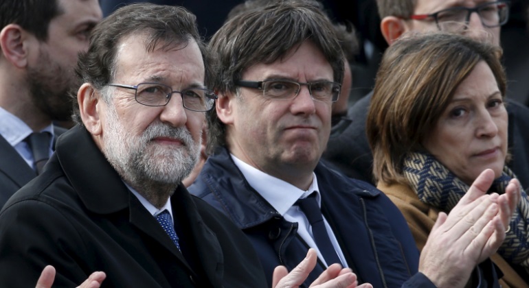 rajoy-puigdemont-acto-reuters.jpg