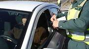 Seis puntos por usar el móvil, 500 euros por llevar detectores de radares...así serán las nuevas multas de la DGT