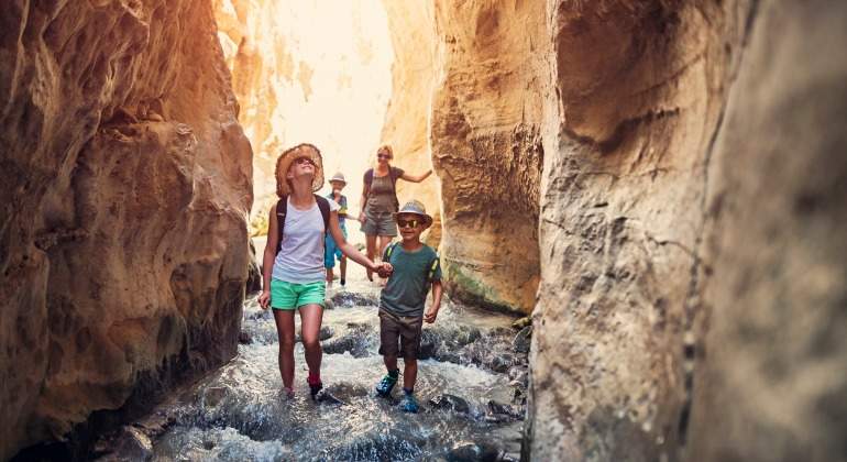 family-hiking-through-rivier-in-andalusia-spain-picture-id844084632.jpg