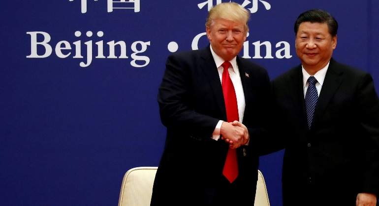 donald-trump-xi-jinping-cogiendose-mano-eeuu-china-reuters-770x420.jpg