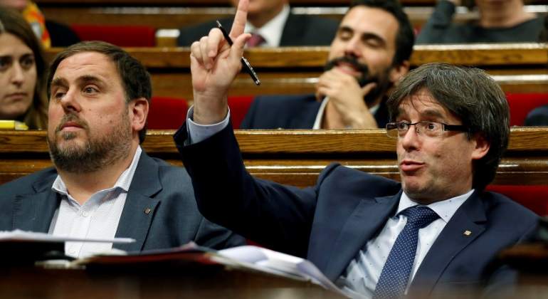 junqueras-puigdemont-reuters.jpg