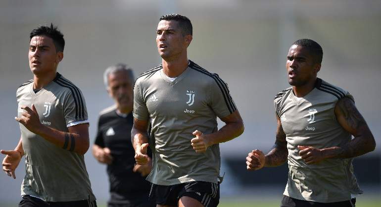 dybala-cristiano-douglas-entrenamiento-juventus-getty.jpg