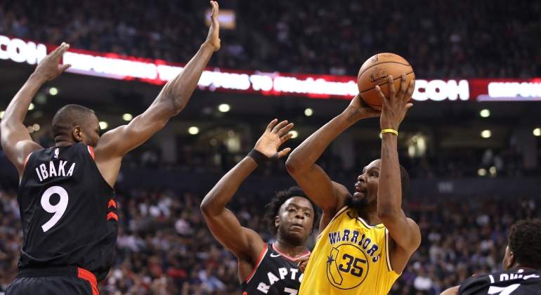ibaka-durant-raptors-warriors-reuters.jpg
