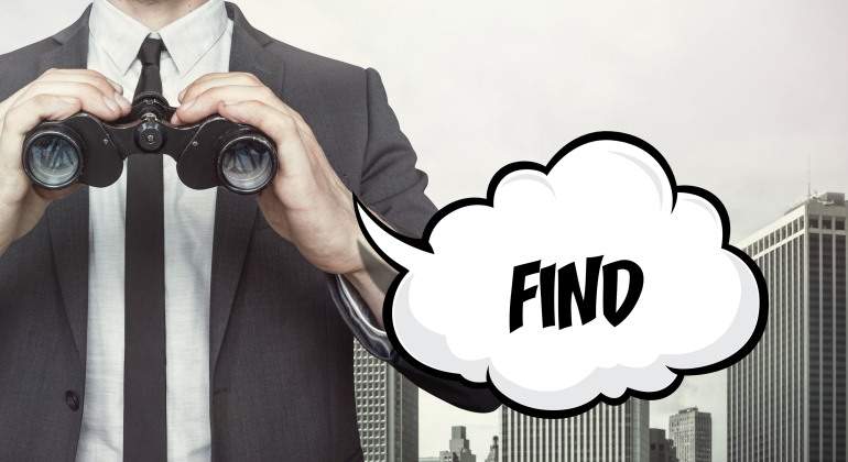 ejecutivo-prismaticos-find-dreamstime.jpg