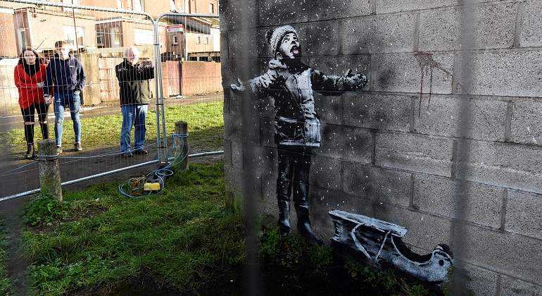 Grafiti-disenado-por-Bansky-Reteurs-Pictures.JPG