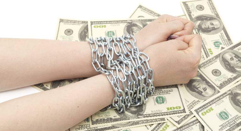 dolar-cadenas-libertad--dreamstime.jpg