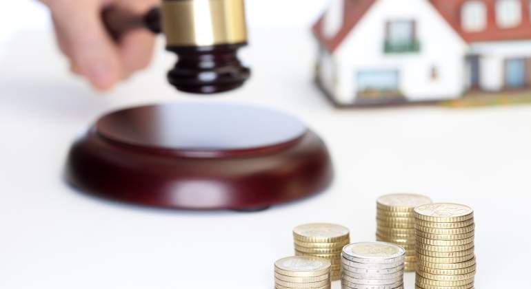 casa-sentencia-monedas-dreamstime.jpg