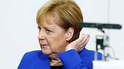 Merkel llama a recuperar la normalidad de la política monetaria un día antes de la reunión del BCE