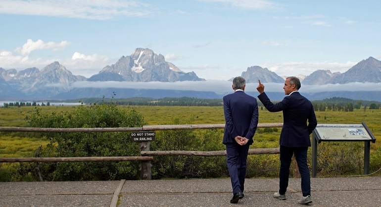 jackson-hole-powell-carney-2019-reuters-770x420.jpg