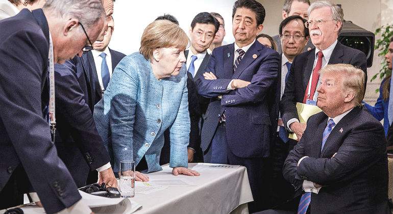 merkel-trump-brazos-g7-reuters.jpg
