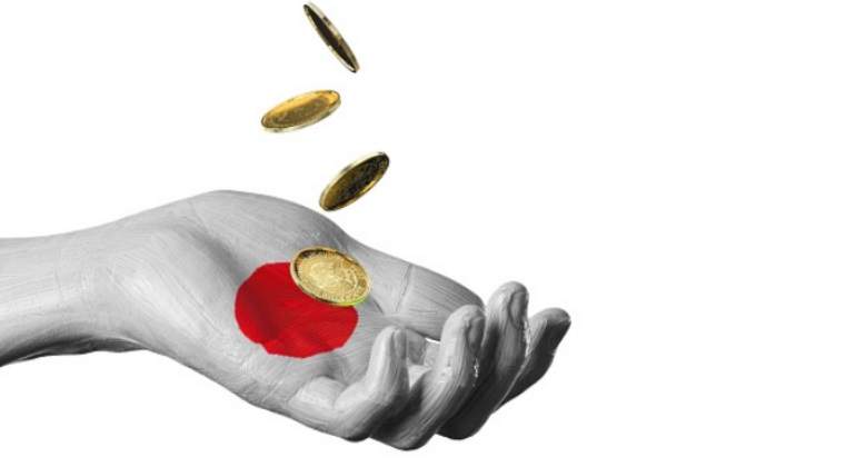 japon-mano-yen-dinero.jpg