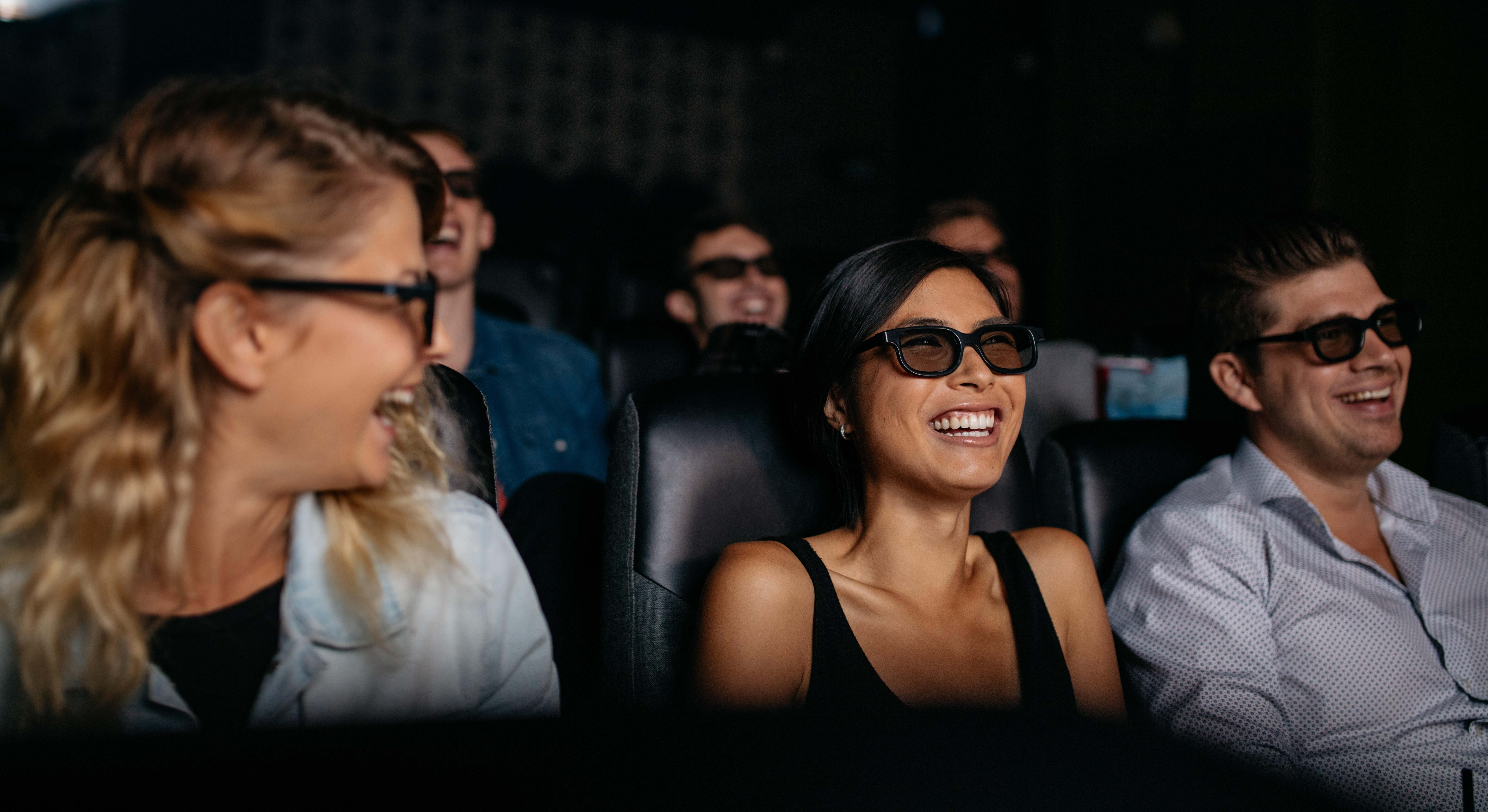 Personas en una sala de cine