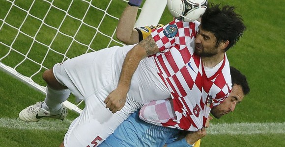 Busquets-agarron-Corluka-2012-reuters.jpg