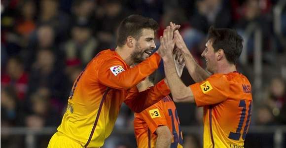 Pique-Messi-celebran-naranja-2012-efe.jpg