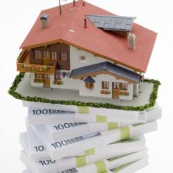 Imagen de una casa con billetes